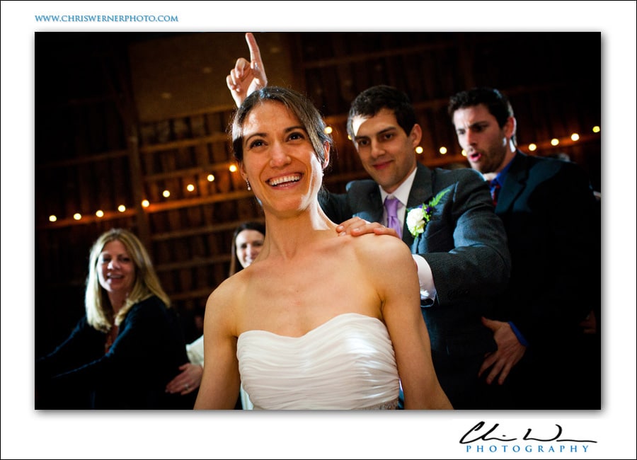 Bride and groom party in a conga line, Upstate New York Wedding.