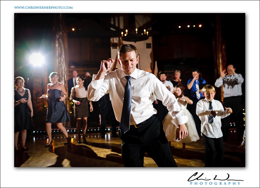 Groom dancing to Footloose at his wedding reception, Presidio Wedding Photography.