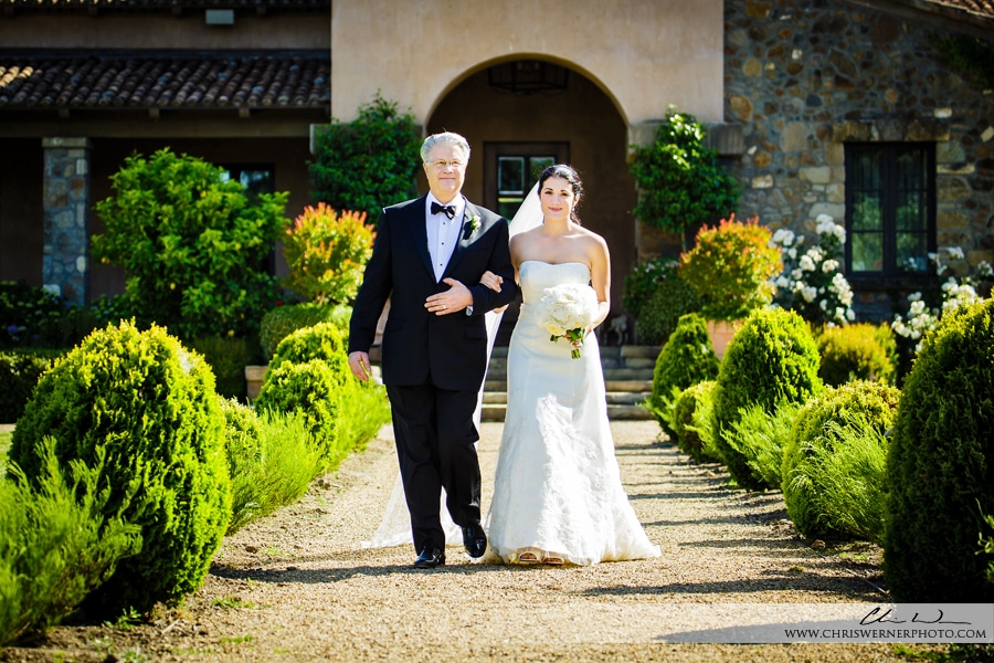 Father of the bride walking his daughter to their Napa Valley Estate Wedding.