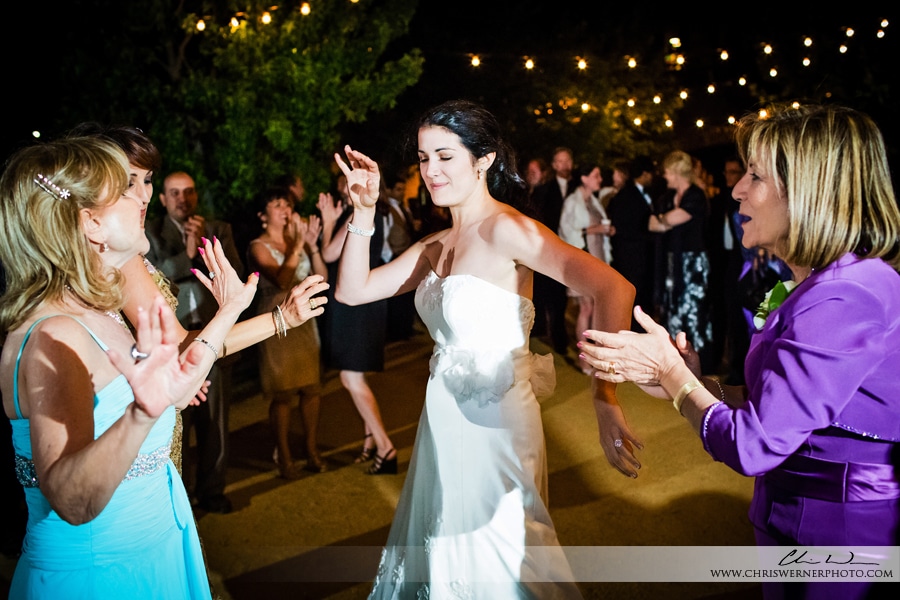 Photo of the bride dancing during her reception, Napa Valley Estate Wedding.