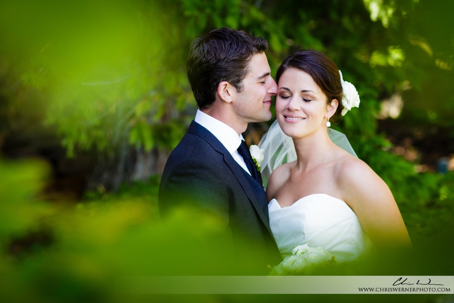 Portrait of the groom kissing the bride, by Wedding Photographers Lake Tahoe.