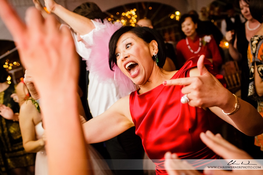 Mother of the bride dancing after the wedding, by Wedding Photographers Napa Valley.