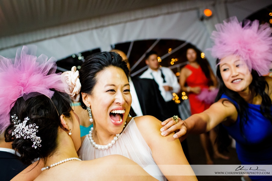 Bride and bridesmaids photos in the wedding tent at Viansa Winery, by Wedding Photographers Napa Valley.