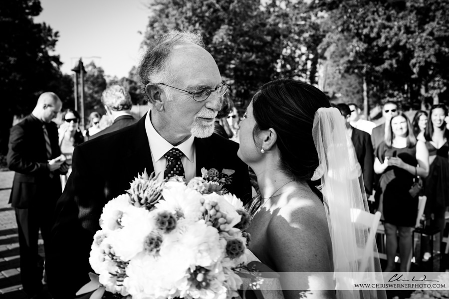 Raleigh wedding photo of the father of the bride giving away his daughter on her wedding day.