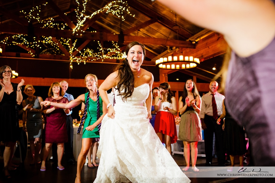 Raleigh wedding reception photo of the bride dancing.
