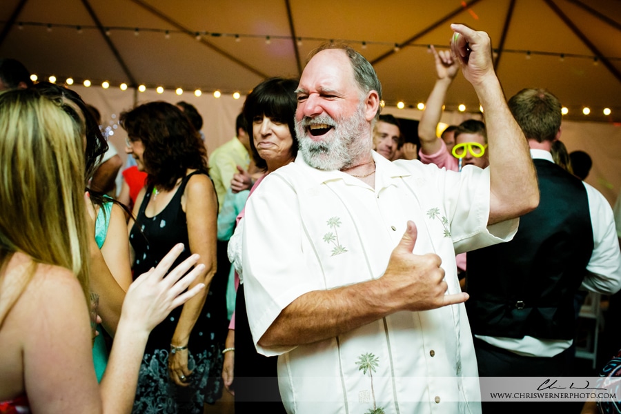 Father of the bride dancing at the wedding reception, by Mourelatos Lake Tahoe Wedding Photographers.