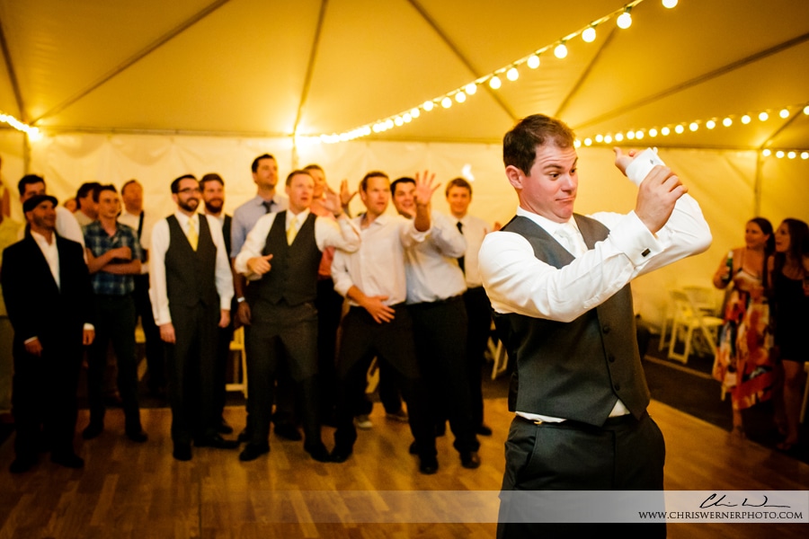 Garter toss wedding photo by Mourelatos Lake Tahoe Wedding Photographers.