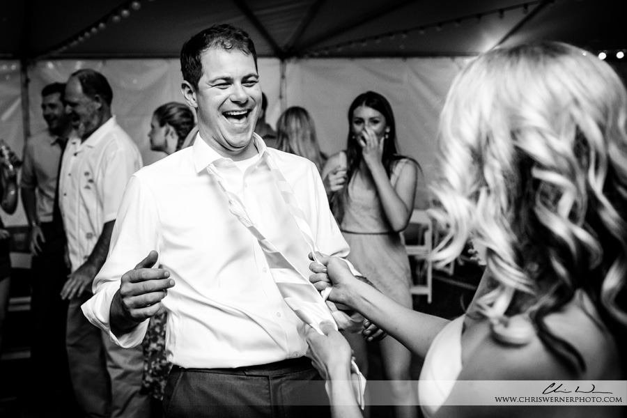 Mourelatos Lake Tahoe Wedding Photographers: Groom and bride dancing at the wedding reception in North Lake Tahoe.