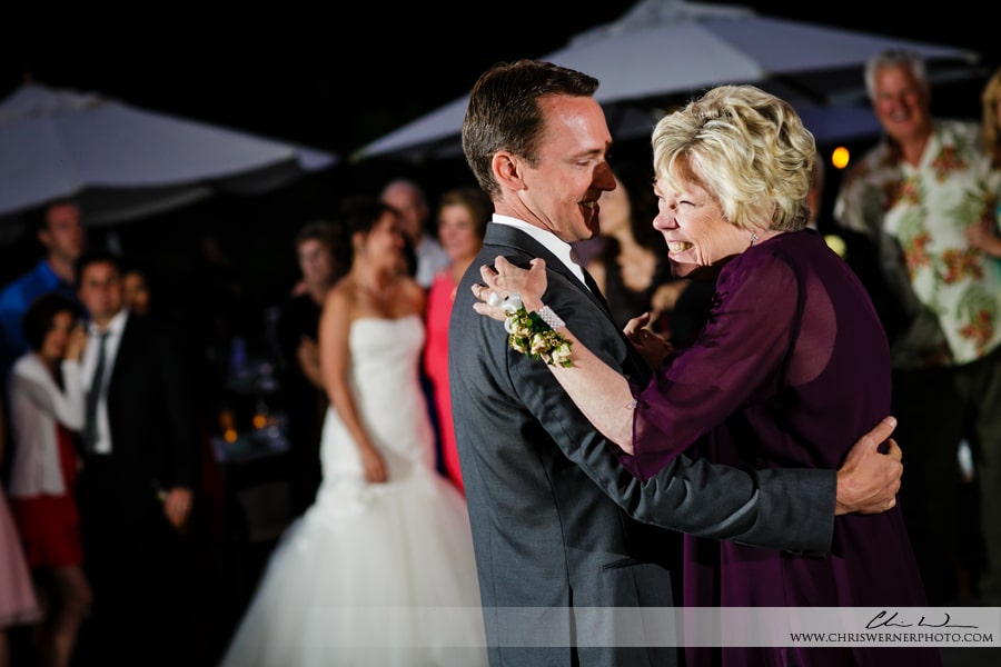 Photo of the mother of the groom dancing with her son, by a Truckee Wedding photographer.