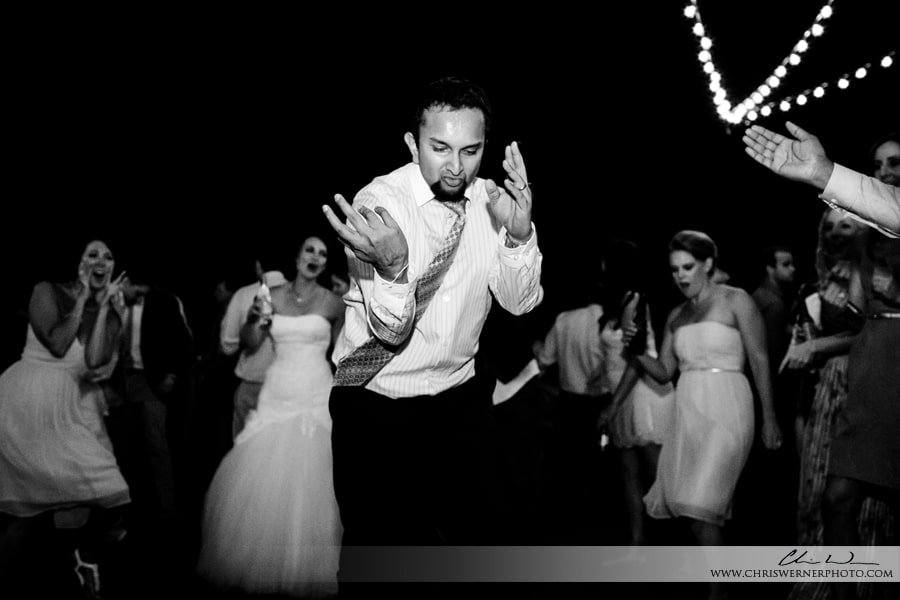 Wedding guests dancing at the wedding party near North Lake Tahoe, by a Truckee Wedding photographer.