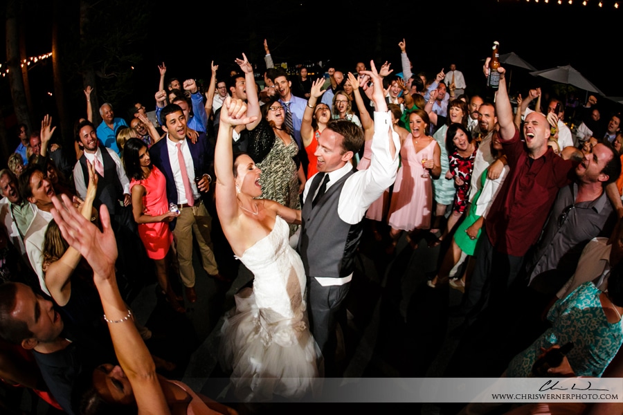 Photo of people dancing at a Lake Tahoe Wedding reception, by a Truckee Wedding photographer.