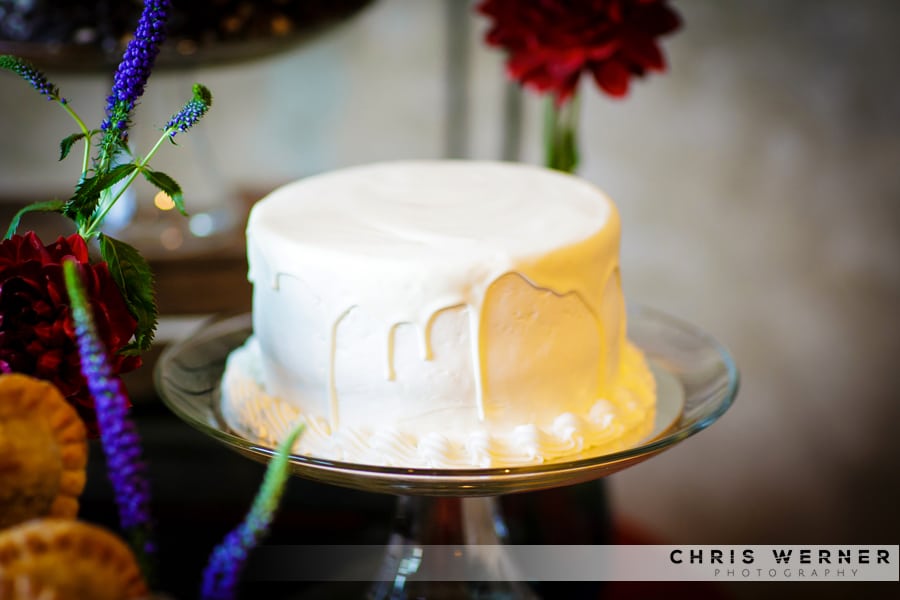 Photo of a simple white wedding cake.