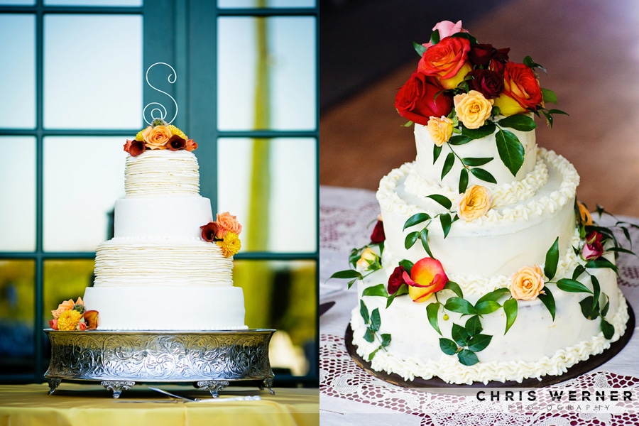 Wedding cakes with red roses and orange roses.