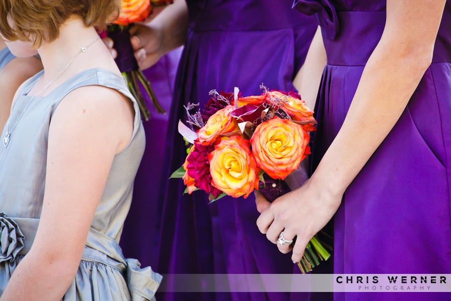 Purple bridesmaid dress and orange Bridesmaid Bouquets