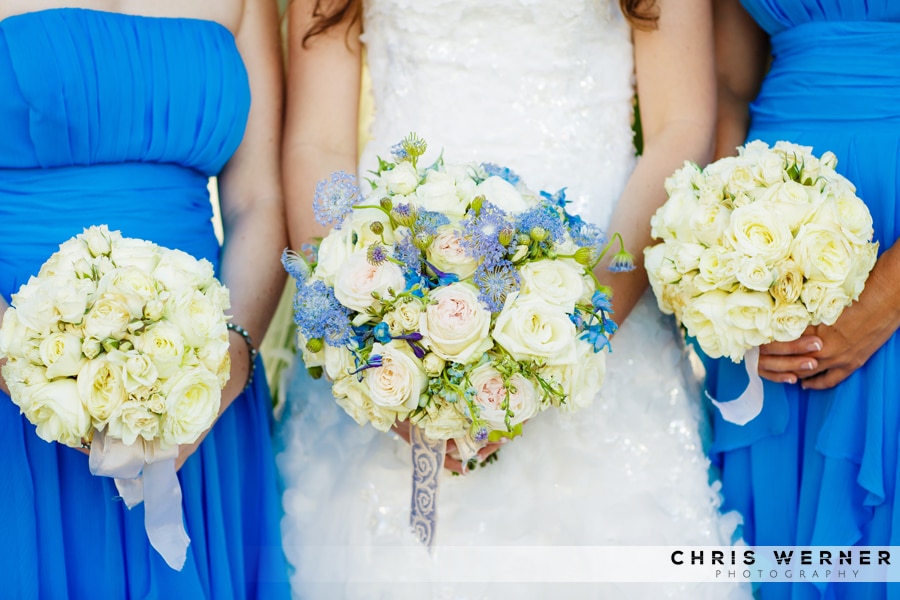 Blue dresses and bridesmaid bouquets.