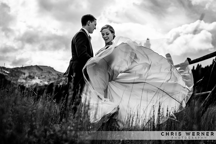 Bride's wedding dress blowing in the wind: Squaw Valley PlumpJack weddings.
