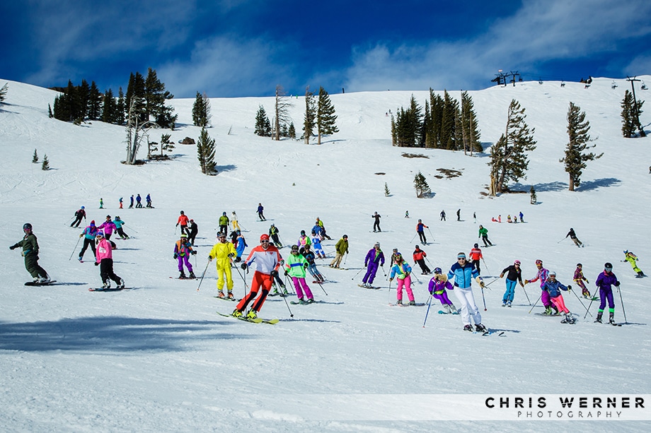 Wedding party skiing before a Squaw Valley winter wedding