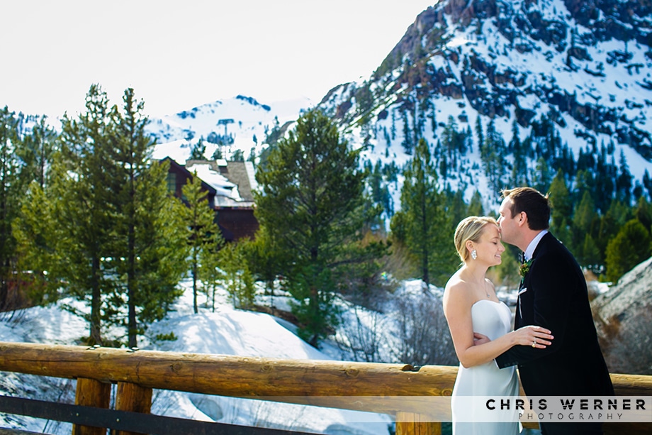 Bride and groom on the PlumpJack bridge for a Squaw Valley winter wedding