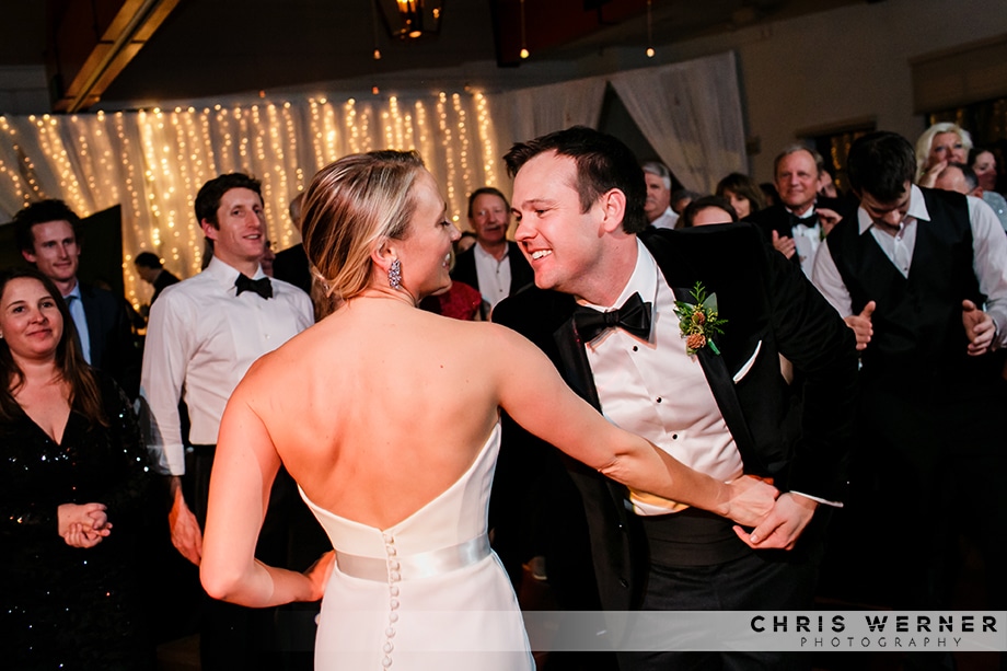 Groom and bride dancing during the reception of their Squaw Valley winter wedding