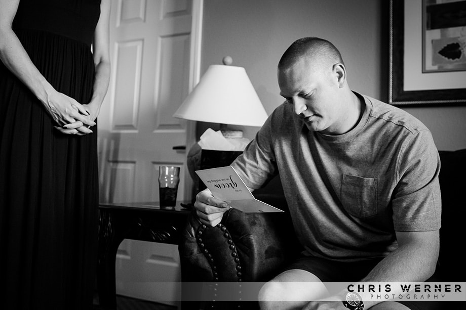 Groom reading a card from his bride. Photograph by a Reno wedding photographer