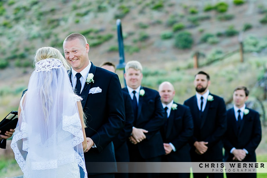 Groom photo during the ceremony by a Reno wedding photographer.