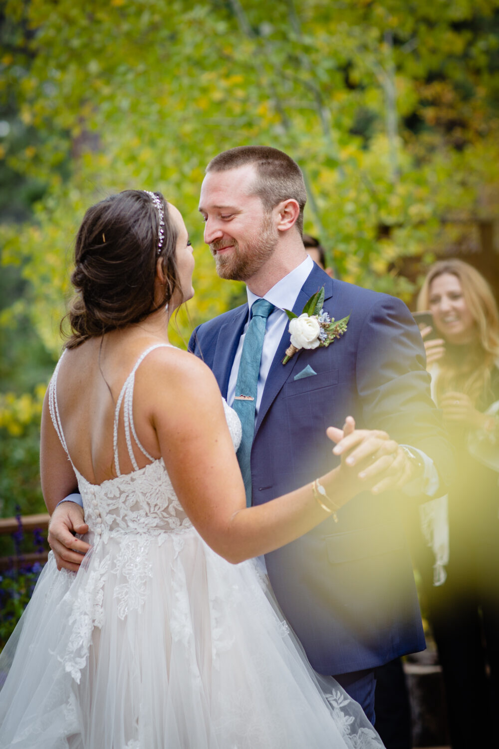 The newlywed's first dance at a Tahoe wedding with fall colors.