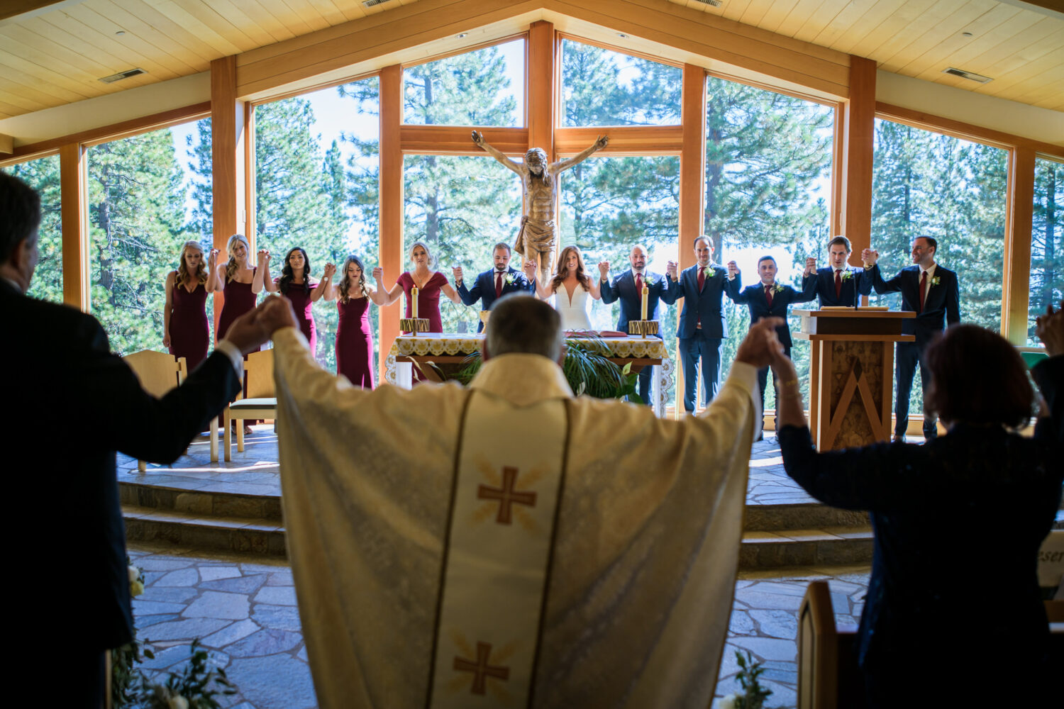 A priest blesses a Catholic wedding at Saint Francis of Assisi church in Incline Village.
