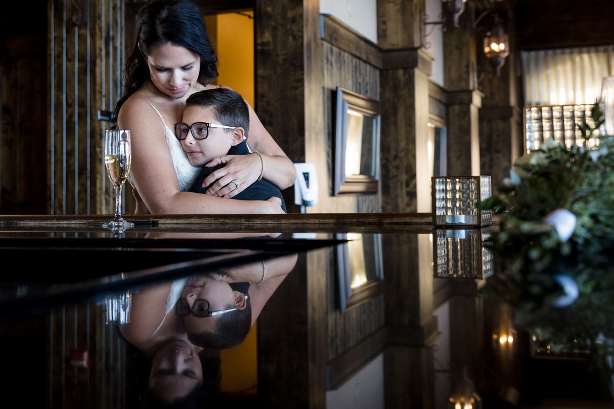 A special moment shared between the bride and her son, captured by wedding photographer Chris Werner.