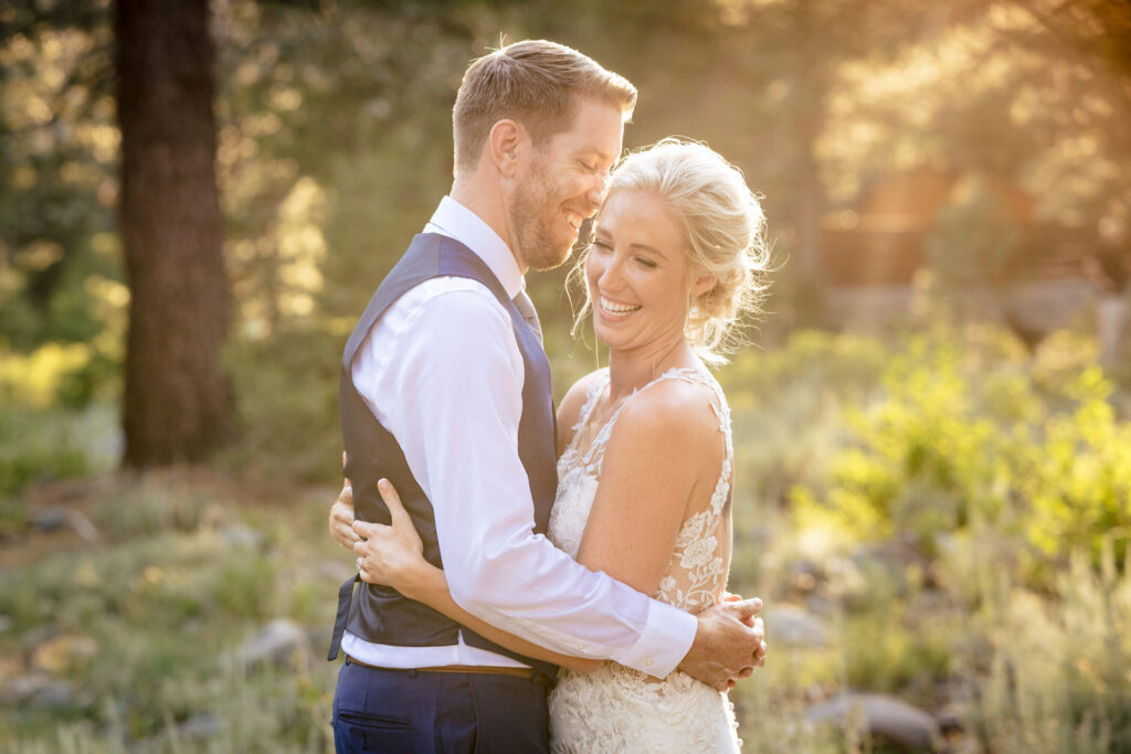 Portrait of the bride and groom in the golden afternoon light at Dancing Pines Resort. 
