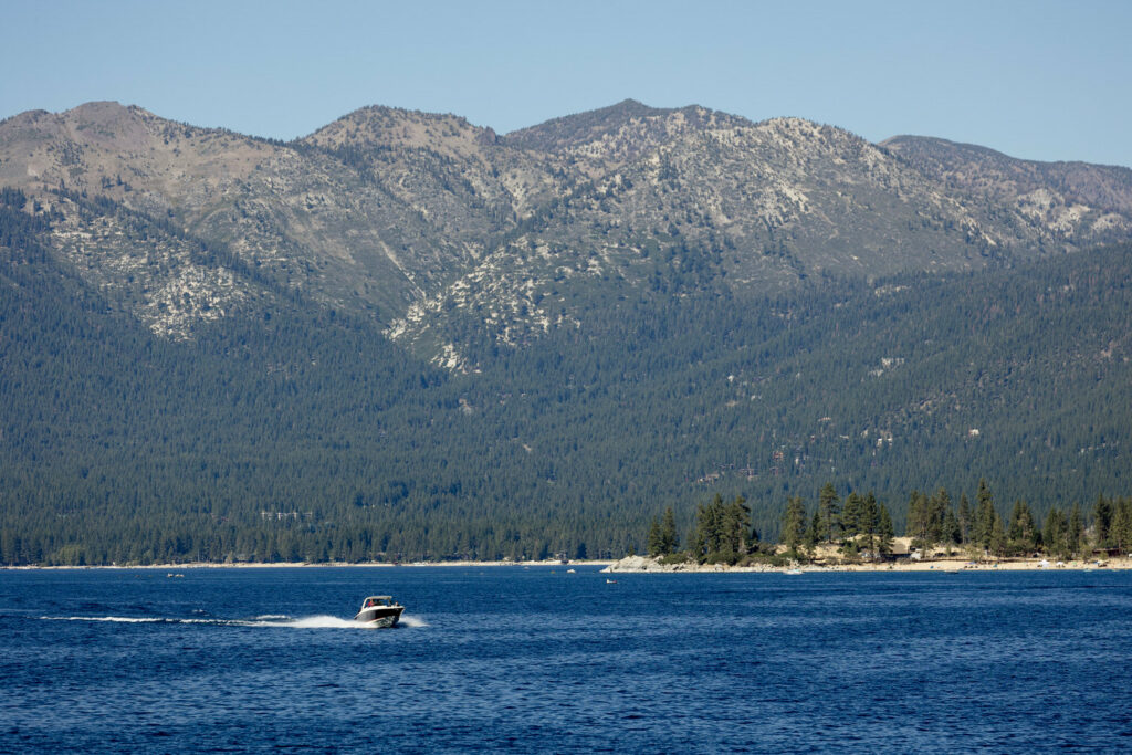 The groom's boat crosses Lake Tahoe on the way from Incline Village to Thunderbird Lodge.