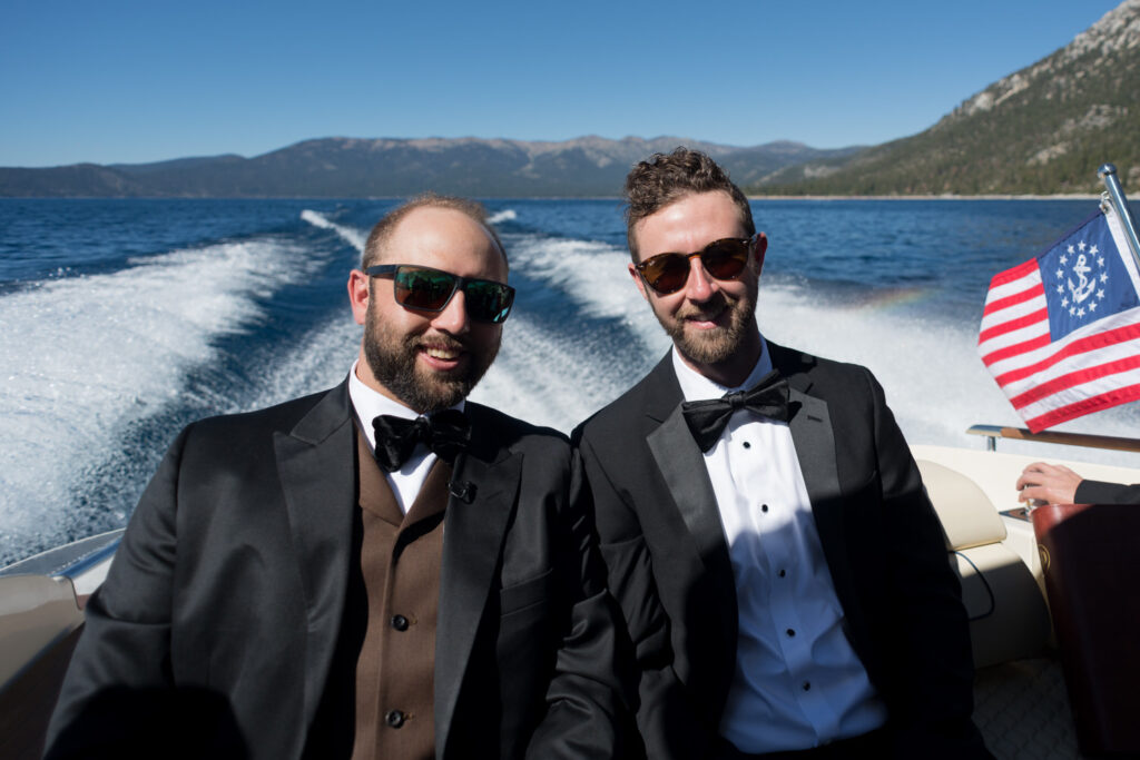 A groom and his best man ride in a motorboat across Lake Tahoe to a wedding at Thunderbird Lodge.