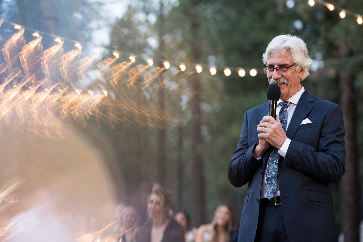 A wedding reception speech  in the forest. 