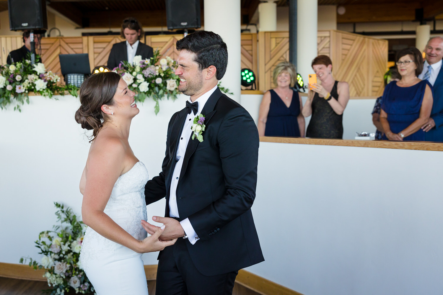 A joyful moment for the bride and groom at their High Camp Palisades Tahoe wedding.