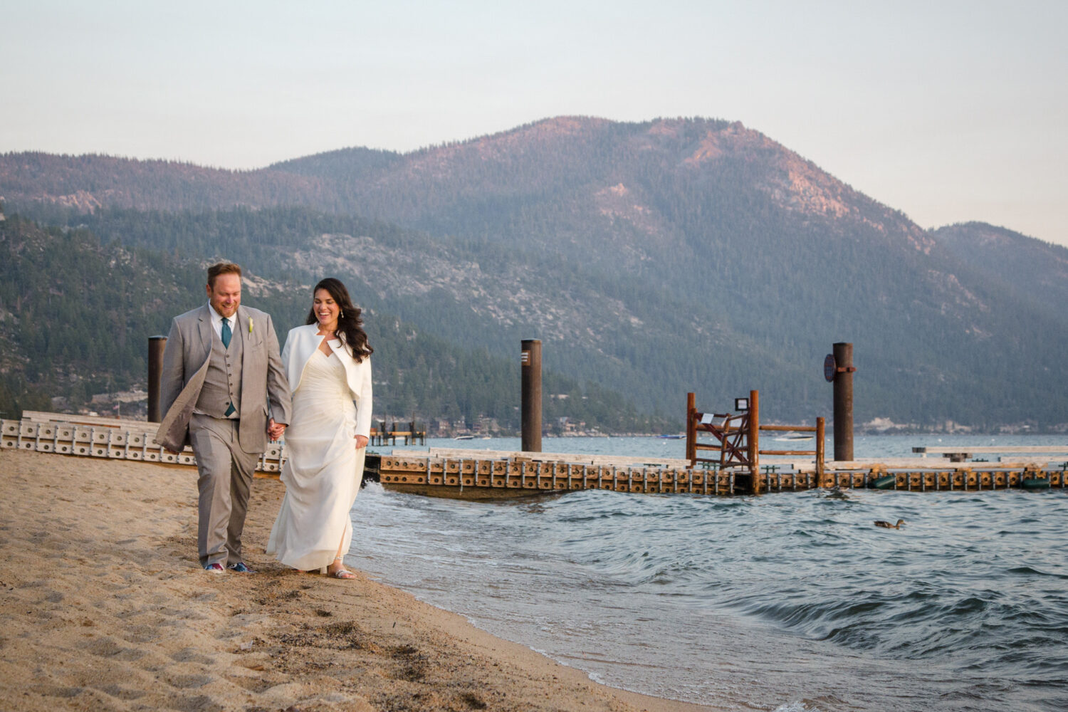 Sunset photos on the beach after a wedding at Hyatt Lake Tahoe.