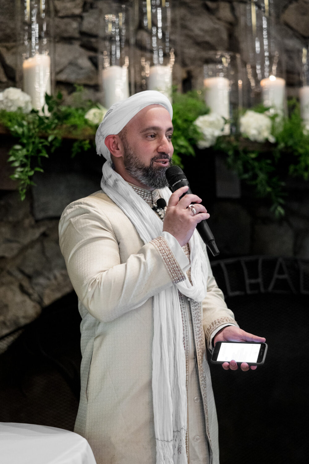 Imam Khalid Latif presents a sermon at a Muslim wedding.