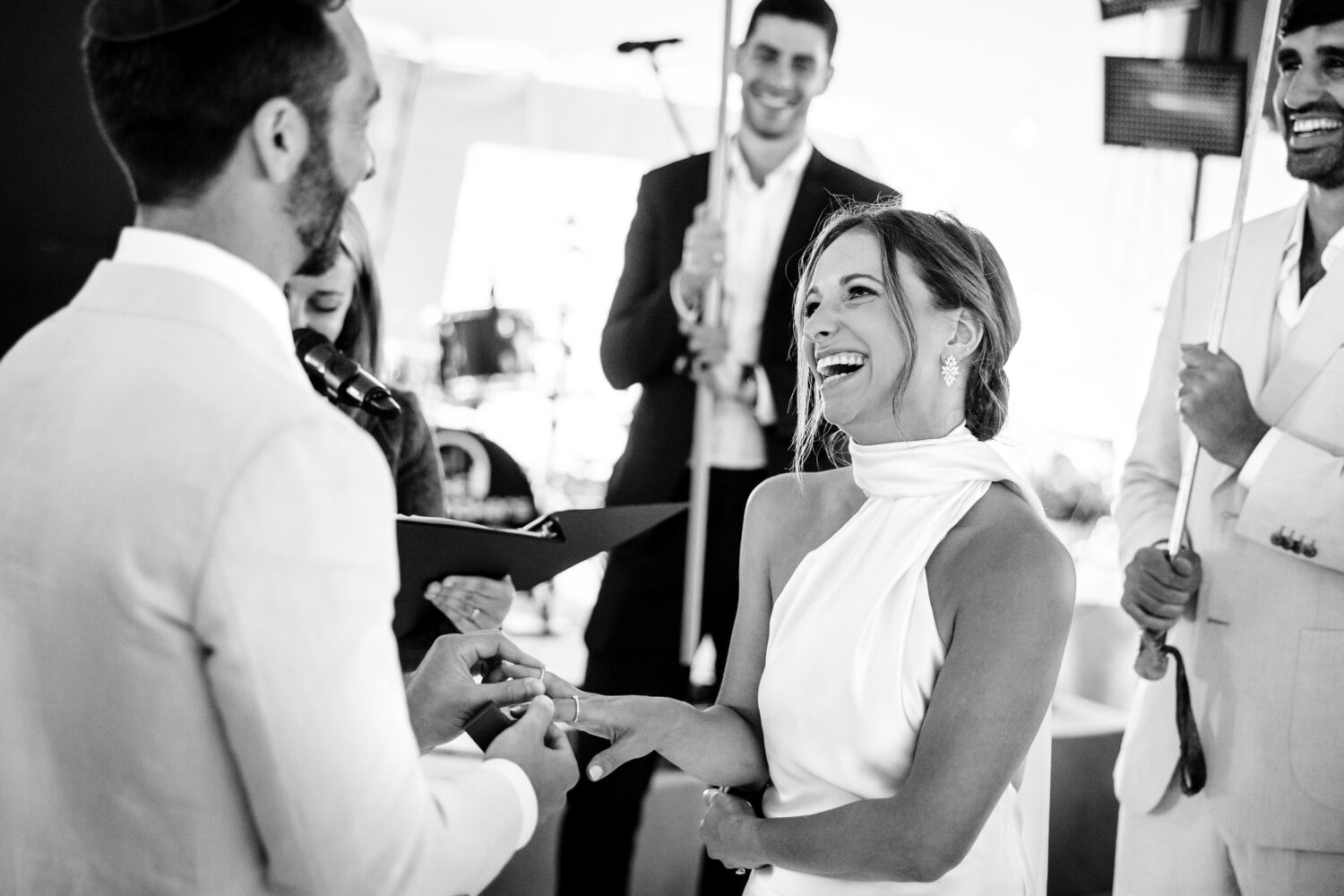 A joyful moment for a bride at her Jewish wedding in Lake Tahoe.