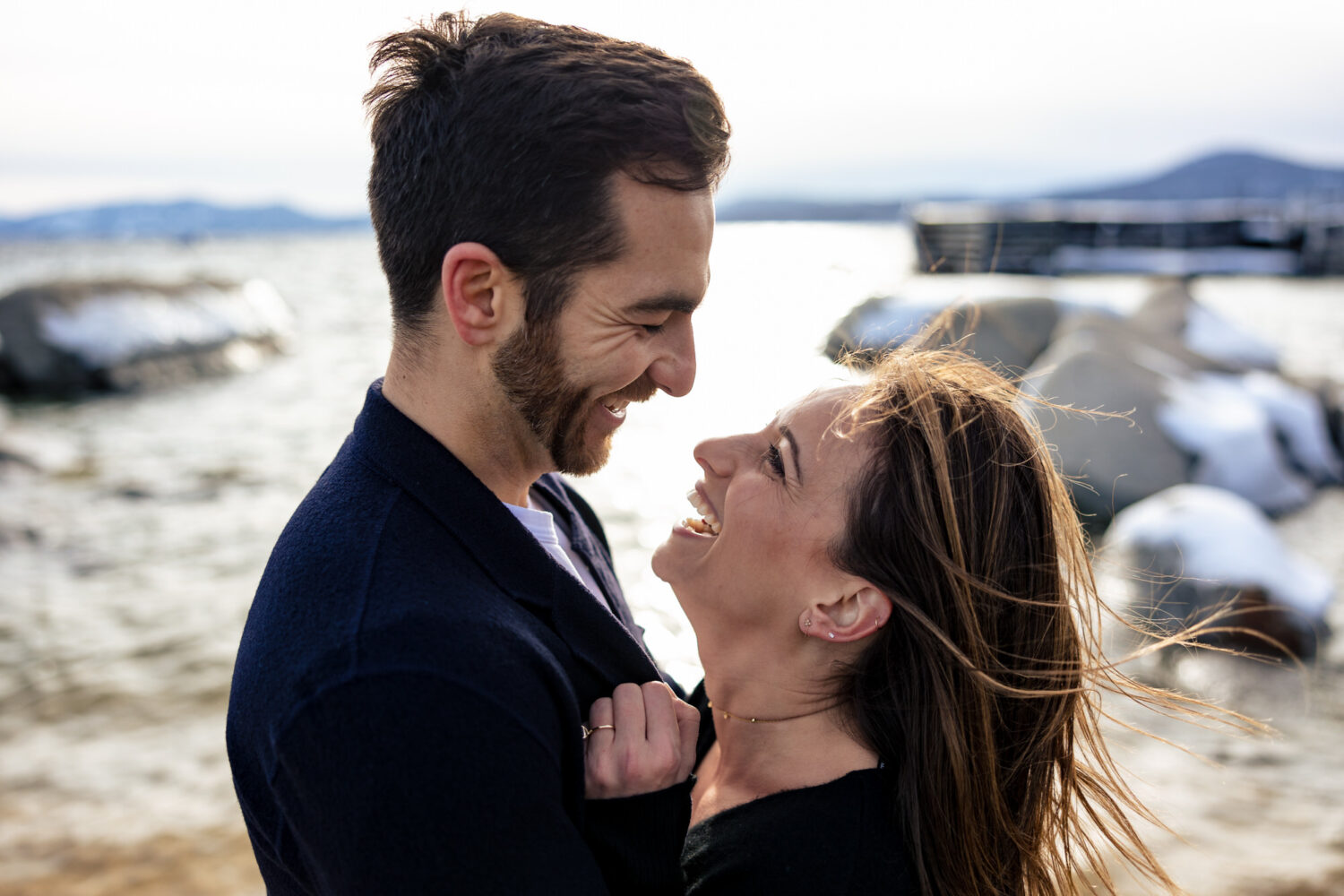 A candid moment captured by photographer Chris Werner during an engagement shoot in Lake Tahoe.