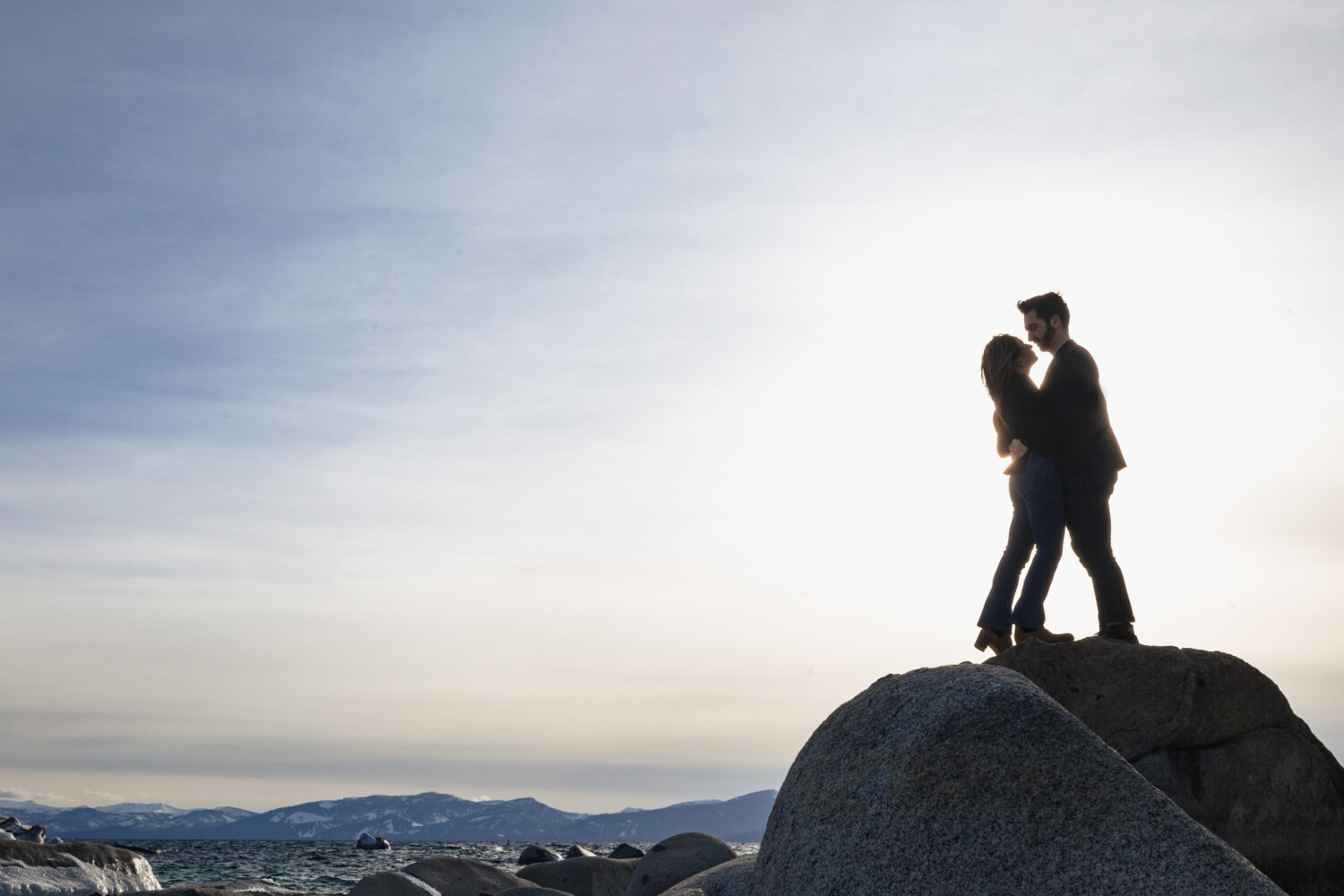 Tahoe engagement shoot by the lake with granite rocks.