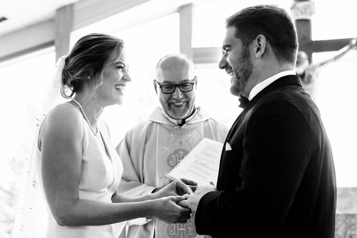 Exchanging wedding rings during a wedding ceremony at St Francis of Assisi in Incline Village.