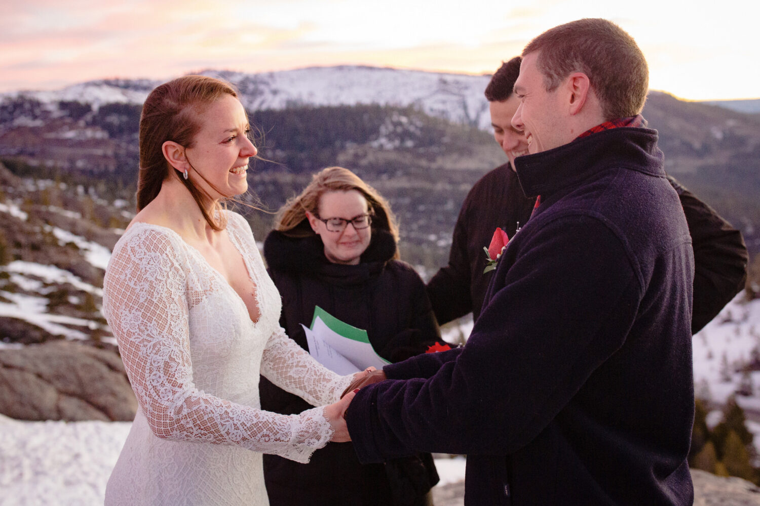 Exchanging vows at a mountaintop elopement in Lake Tahoe.